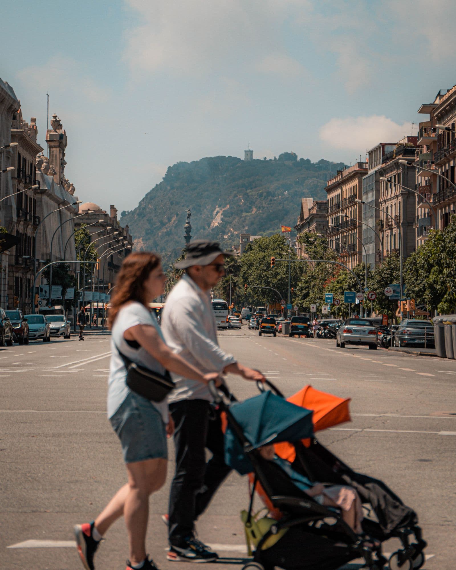 A family out walking with a stroller