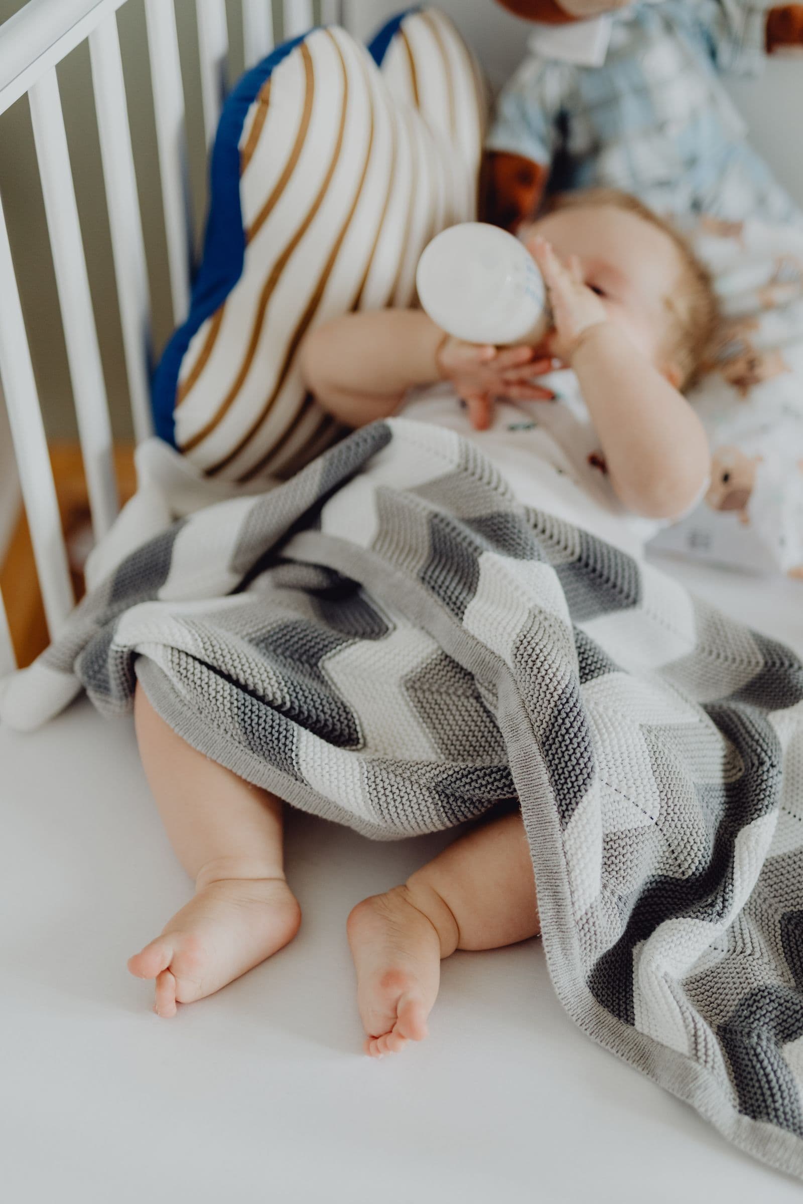 A baby sleeping in a cozy nursery