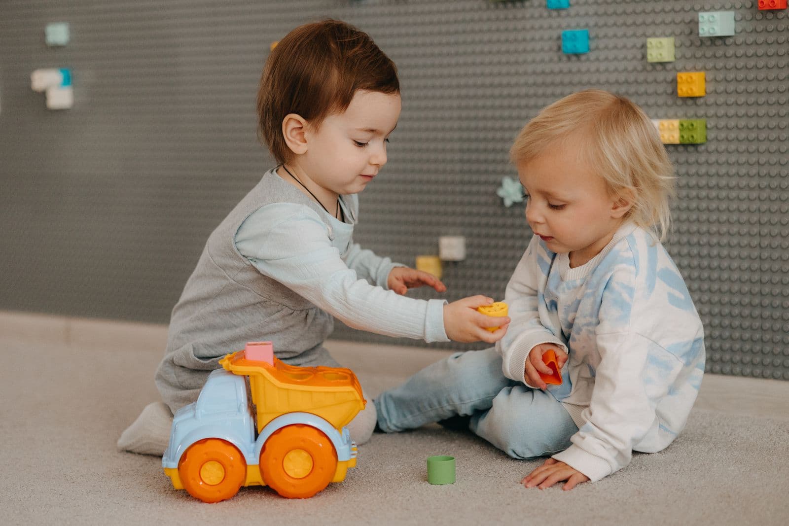 Two young children playing together